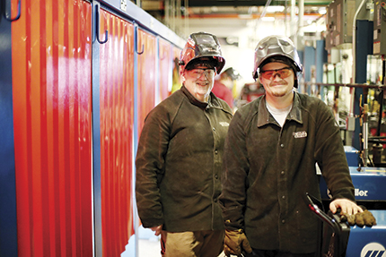 Wayne Dotson (left) and his son, Andrew, in the WCC welding lab.