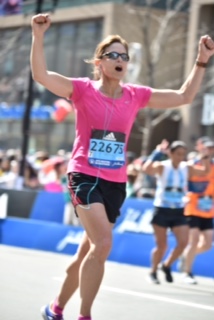 WCC Dean of Arts and Sciences Kristin Good crosses the finish line at the Boston Marathon. (Photo by MarathonFoto.com)