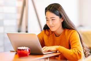 college student at computer